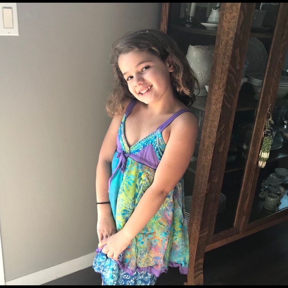 Pretty dress fun, fancy, and cute.